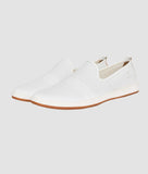 Big Boon Men's perforated lightweight slip-on loafers in white.