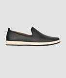 Men's lightweight perforated slip-on loafers by Big Boon, black with a white sole.