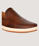 Men's brown perforated slip-on loafers, lightweight and stylish.