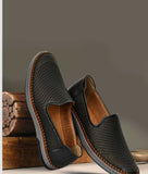 Big Boon men's black ethnic laser-cut leather slip-on loafers with flat TPR sole