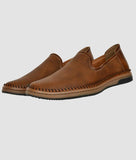Men's stylish brown ethnic loafer shoes with synthetic leather upper and TPR sole, slip-on design and flat heel.