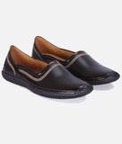 Black men's ethnic shoes with slip-on design and stitched detailing